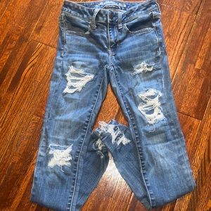 American eagle skinny jeans ripped design.
